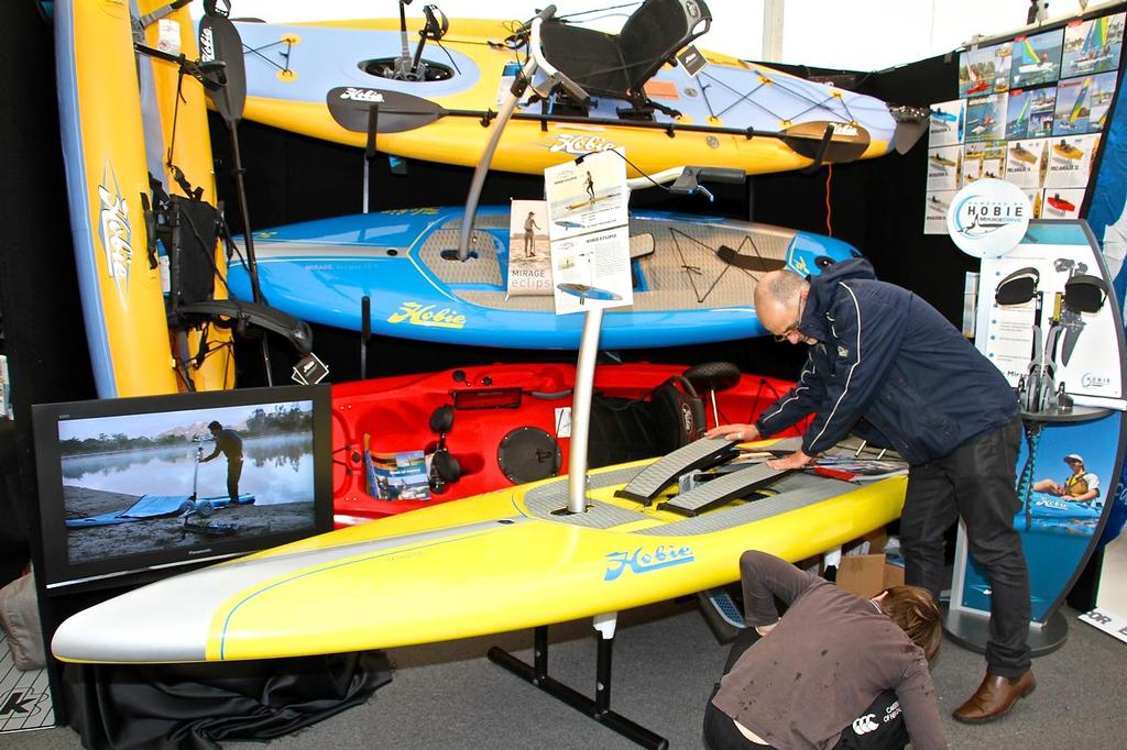 Auckland On The Water Boat Show - Day 2 - September 30, 2016 - Viaduct Events Centre - Checking underneath the Hobie SUP at The Water Shed © Richard Gladwell www.photosport.co.nz